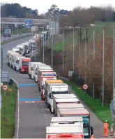  ?? PHOTO: GARETH FULLER/PA WIRE ?? Bottleneck: Freight lorries queueing to access the Eurotunnel terminal in Folkestone, England.