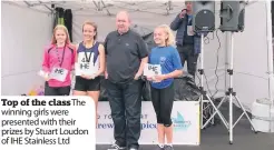  ??  ?? Top of the classthe winning girls were presented with their prizes by Stuart Loudon of IHE Stainless Ltd