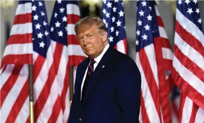  ??  ?? Donald Trump arrives to deliver his acceptance speech for the Republican nomination, on the South Lawn of the White House. Photograph: Brendan Smialowski/AFP/Getty Images