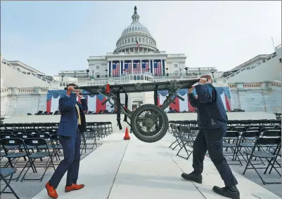  ?? BRIAN SNYDER / REUTERS ?? Workers prepare for the inaugurati­on of US president-elect Donald Trump at the Capitol in Washington on Thursday. Trump was scheduled to be the 45th president of the country on Friday.