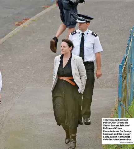  ?? Finnbarr Webster ?? Devon and Cornwall Police Chief Constable Shaun Sawyer, left, and Police and Crime Commission­er for Devon, Cornwall and the Isles of Scilly, Alison Hernandez visit the scene yesterday