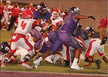  ?? Terrance Armstard/News-Times ?? Paving the way: El Dorado's Alex Boone (82) helps clear a path for running back Richard Kesee to score a touchdown during the Wildcats' contest against Magnolia last year.