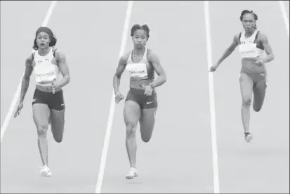  ??  ?? Women’s 100m Semifinal 2/3 - Kennedy Park, Lima, Peru. Jamaica’s Elaine Thompson, Brazil’s Vitoria Cristina and Barbados’ Ariel Jackson in action. REUTERS/Henry Romero