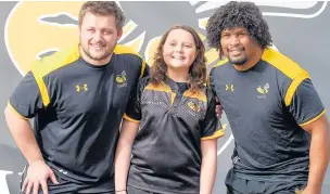  ??  ?? Winner Imogen Baker with Wasps players Phil Swainston and Ashley Johnson