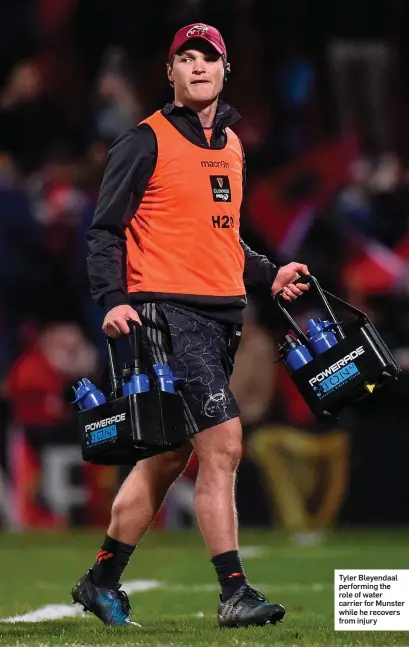  ??  ?? Tyler Bleyendaal performing the role of water carrier for Munster while he recovers from injury