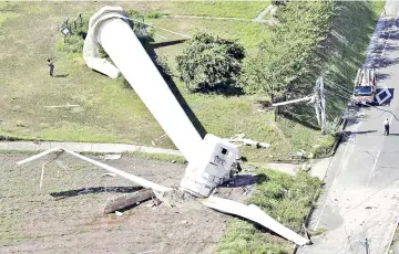  ??  ?? A wind turbine which was knocked down as Typhoon Cimaron passed through western Japan is pictured in Awaji, Hyogo Prefecture, Japan. — Reuters photo