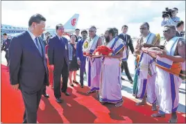  ?? The Associated Press ?? In this handout photo provided by the Indian Ministry of External Affairs, Chinese President Xi Jinping arrives in Chennai, India, on Friday for a summit with Indian Prime Minister Narendra Modi. They were set to continue their talks Saturday.