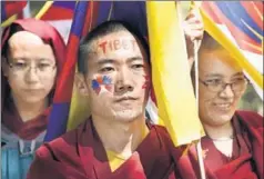  ?? GETTY IMAGES ?? Tibetan Buddhist monks stage a rally on March 10, 2018 in Dharamsala, on the 59th anniversar­y of the failed 1959 uprising against Chinese occupation of Tibet.