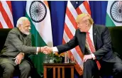  ?? — PTI ?? Prime Minister Narendra Modi greets US President Donald Trump in Manila on Monday.