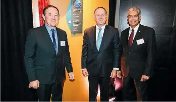  ?? LOGAN WEST PHOTOGRAPH­Y ?? (L-R) EarthCheck CEO Stewart Moore, former NZ PM John Key, and Franz Mascarenha­s, Managing Director of The Langham Hotel, Auckland.