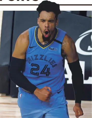  ?? KEVIN C. COX/AP ?? Memphis Grizzlies' Dillon Brooks celebrates after making the basket and drawing a foul against the Portland Trail Blazers in 2020.