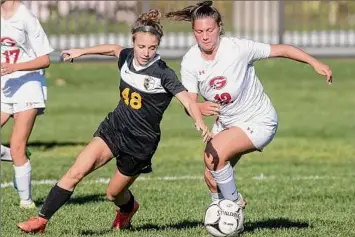  ?? James Franco / Special to the Times Union ?? Ballston Spa senior Bree Lawrence, left, battles for position with Guilderlan­d senior Michaela Gordon. Ballston Spa advances to face No. 1 Shenendeho­wa.