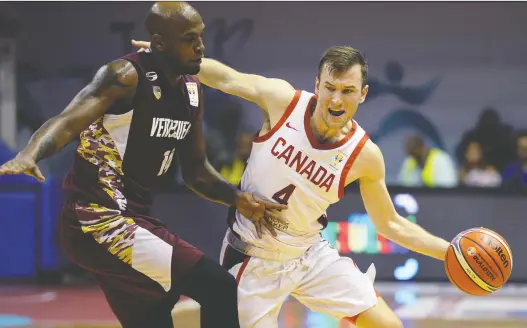  ?? FEDERICO PARRA/AFP/GETTY IMAGES, FILE ?? Canada’s Brady Heslip, seen here during a FIBA Americas Qualifier match in Caracas in 2018, has chosen to enter the business world.