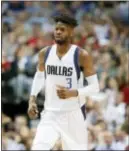  ?? TONY GUTIERREZ — THE ASSOCIATED PRESS ?? Dallas forward Nerlens Noel runs up court during a game against the Clippers in Dallas.