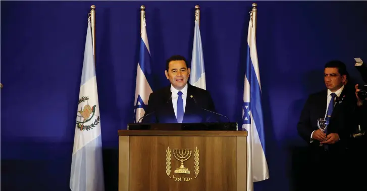  ?? (Reuters) ?? GUATEMALAN PRESIDENT Jimmy Morales speaks at a dedication ceremony of the Embassy of Guatemala in Jerusalem, at the King David Hotel on Wednesday.