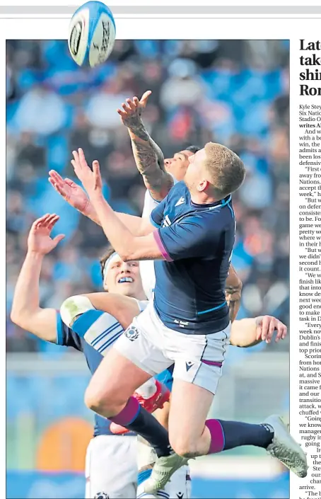  ?? ?? Finn Russell battles in this aerial duel yesterday