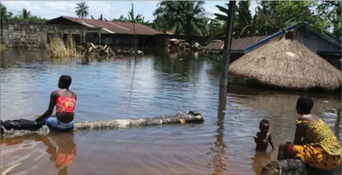  ??  ?? A flooded community in Benue