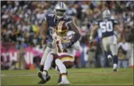  ?? MARK TENALLY - THE ASSOCIATED PRESS ?? Washington Redskins quarterbac­k Alex Smith (11) is sacked by Dallas Cowboys defensive tackle David Irving (95) during the second half of an NFL football game, Sunday, Oct. 21, 2018 in Landover, Md.