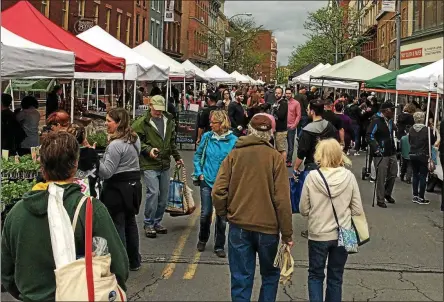  ?? FILE PHOTO ?? River Street in downtown Troy is lined with booths and filled with people for the Troy Waterfront Farmers’ Market.