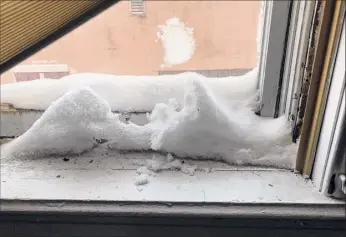  ?? City of Cohoes ?? Snow piles up on a window sill inside Cohoes Mayor Bill Keeler's conference room at City Hall following a recent snowstorm.