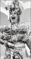  ?? AP 1983 ?? Willard Scott performs a Carmen Miranda impersonat­ion during the “Today” show in 1983 in exchange for a $1,000 donation to the USO.