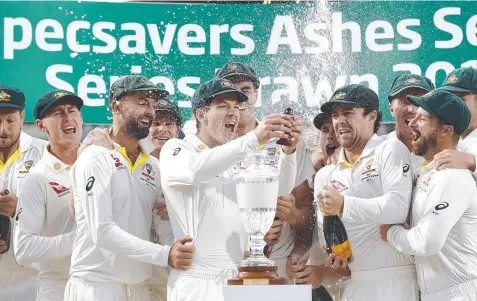  ?? Picture: GETTY IMAGES ?? PARTY TIME: Tim Paine and his Australian team celebrate retaining the Ashes in their drawn series with England.