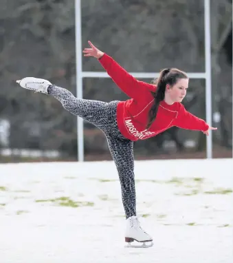  ??  ?? Graceful Millie Dingwall enjoys the cold corner of‘The Rec’near her home in Pitlochry