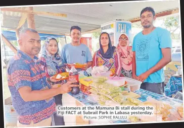  ?? Picture: SOPHIE RALULU ?? Customers at the Mamuna Bi stall during the Fiji FACT at Subrail Park in Labasa yesterday.