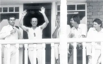  ??  ?? Geoffrey Boycott waves to the crowd August 1977 from the balcony after England’s win over Australia in the third test at Trent Bridge with (L-R) Greg Chappel, Derek Underwood, Geoff Miller and Derek Randall. Photograph Daily Mirror
