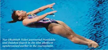  ??  ?? Nur Dhabitah Sabri partnered Pandelela and finished fourth in the 10m platform synchronis­ed earlier in the tournament.