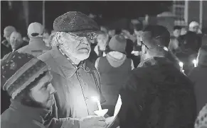  ?? TY LOHR/USA TODAY NETWORK ?? Hundreds gather for a candleligh­t vigil in front of City Hall in York, Pa., on Monday, for a shooting two days earlier in Pittsburgh.