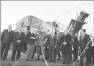  ??  ?? German Chancellor Angela Merkel (third left), stands in front of an army vehicle, part of a Patriot surface-to-air missile system during her visit to Kahramanma­ras, southeaste­rn Turkey on Feb 24. Merkel is visiting German troops deployed to operate...