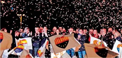  ?? AFP ?? Centre-right party Ciudadanos (Citizens) candidate Ines Arrimadas and other party members celebrate their win in Barcelona. —
