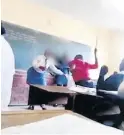  ??  ?? In this video, a teacher is seen caning female pupils at Umdlamfe Secondary