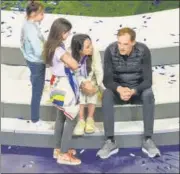  ?? GETTY IMAGES ?? Chelsea manager Thomas Tuchel sits with his family after winning the Champions League final.