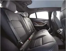  ??  ?? TOP RIGHT: There’s plenty of room in the back to accommodat­e passengers in typical Jaguar luxury