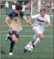  ?? GENE WALSH — DIGITAL FIRST MEDIA ?? La Salle’s Pat McCartney dribbles up field as Wood’s Matt Murphy defends earlier this season.