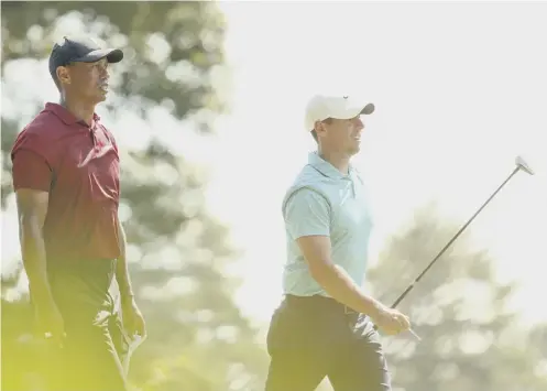  ??  ?? 0 Tiger Woods, pictured with Rory Mcilroy in Boston last week, has warned of ‘six or seven inches of gnarly rough’ at Olympia Fields.