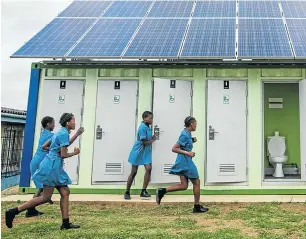  ??  ?? A toilet system that uses a solar-powered electroche­mical reactor is being tried out at a South African school.