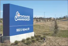  ?? NWA Democrat-Gazette/BEN GOFF ?? A sign for the new Simmons plant stands along the Arkansas Highway 59 entrance to the plant between Gentry and Decatur.