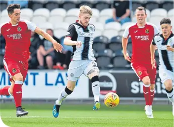  ??  ?? One down, five to go. Hayden Coulson scores the opener for St Mirren