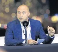  ?? AL DIAZ/MIAMI HERALD ?? Miami Marlins co-owner Derek Jeter speaks during a town hall meeting with fans at Marlins Park in Miami on Tuesday, telling them that making the team a winner would take time.