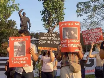  ?? PROTEST. Human rights groups and progressiv­e organizati­ons protest the killing of five activists during simultaneo­us police raids on Sunday, March 7, 2021. (Karapatan) ??