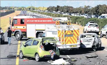  ?? PHOTO: DAVID RITCHIE ?? Debris strewn on the road at the scene of an accident on the N2 between Somerset West and Cape Town. The large number of road accidents are hitting the country’s GDP.