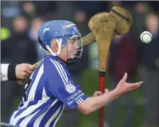  ??  ?? Goalscorer Cian Byrne testing the St. Kieran’s defence.