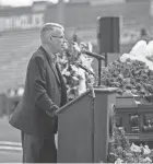  ?? ?? Bill Smith shares stories of Florida State baseball coach Mike Martin during a celebratio­n of life service at Dick Howser Stadium.