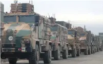  ?? (Khalil Ashawi/Reuters) ?? TURKISH MILITARY vehicles are seen in Hazano near Idlib, Syria, earlier this month.