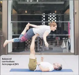  ??  ?? Balanced curriculum: Acro yoga at JW3