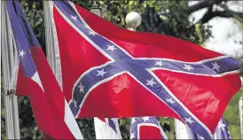  ?? ASSOCIATED PRESS 2011 ?? Confederat­e flags will no longer be allowed on flagpoles at national cemeteries on Memorial Day or Confederat­e Memorial Day, the VA said.