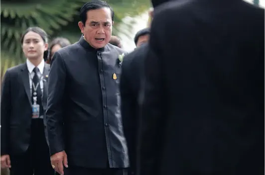  ?? Picture: REUTERS ?? SMOKESCREE­N?: After a bomb injured 22 people on Monday, junta leader General Prayut Chan-ocha is suddenly having ‘second thoughts’ about a promised 2018 poll.